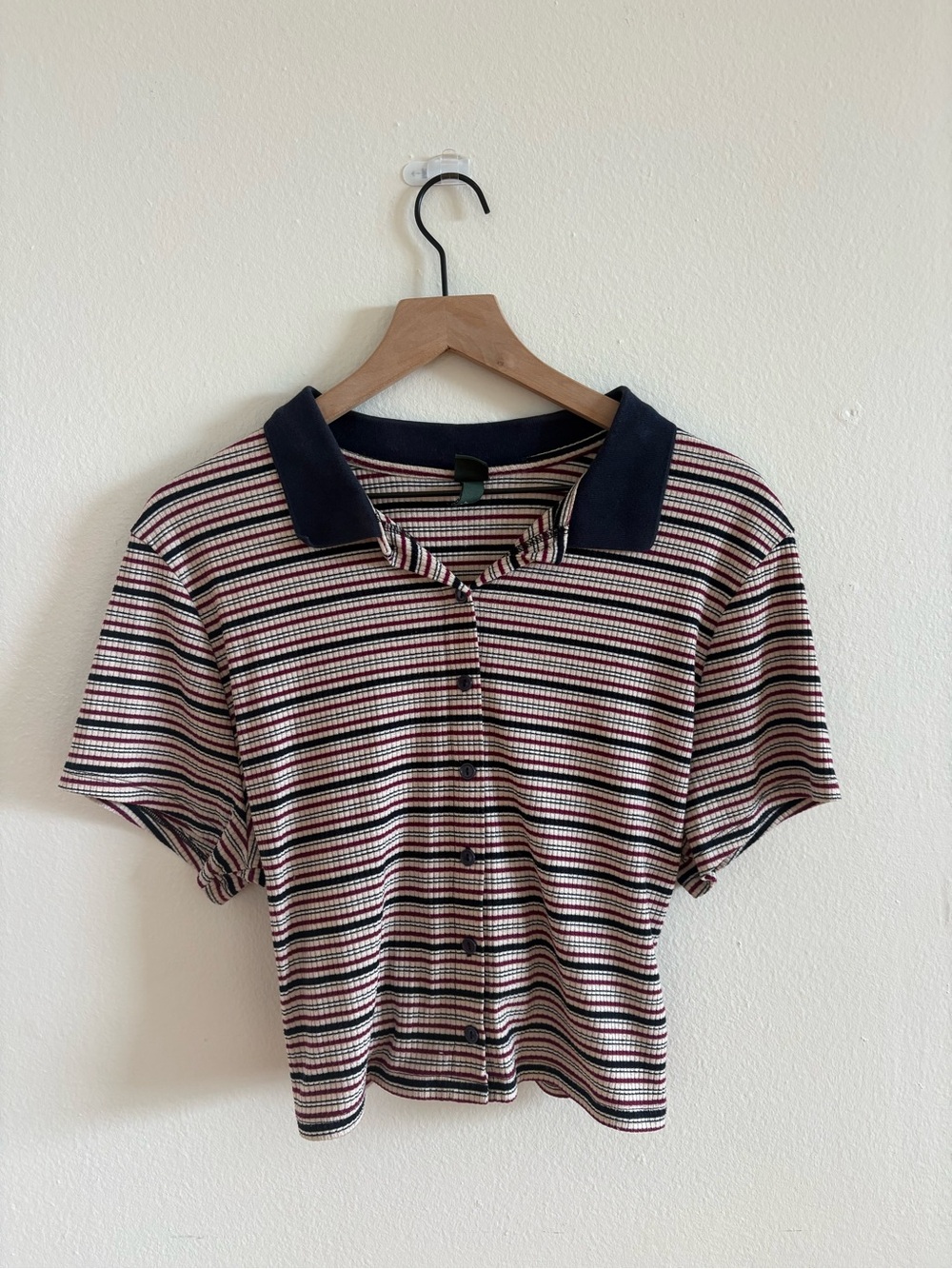 Striped Short-Sleeve Polo Top in navy, cream, and burgundy